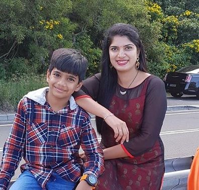 Deepthi TV 9 anchor with her son.